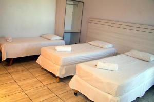 Hotel Supreme - Pistão Sul - Próximo ao Taguatinga Shopping客房内的一张或多张床位