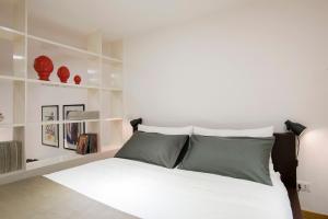 Łóżko lub łóżka w pokoju w obiekcie Cozy Loft @ Monti