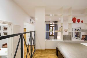 Łóżko lub łóżka w pokoju w obiekcie Cozy Loft @ Monti