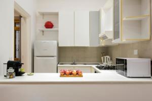 Kuchnia lub aneks kuchenny w obiekcie Cozy Loft @ Monti
