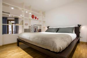 Łóżko lub łóżka w pokoju w obiekcie Cozy Loft @ Monti