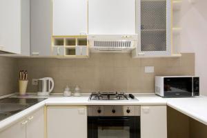 Kuchnia lub aneks kuchenny w obiekcie Cozy Loft @ Monti