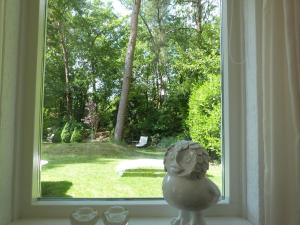 Gallery image of Detached villa with enclosed wooded garden with lawn and bubble bath in Holten