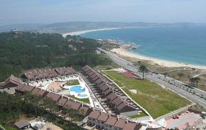 an aerial view of a resort near the beach at Raeiros 45 in O Grove