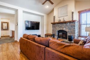 a living room with a couch and a fireplace at Lodges 1193 in Mammoth Lakes