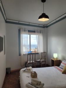 Кровать или кровати в номере The Handmade House Azores