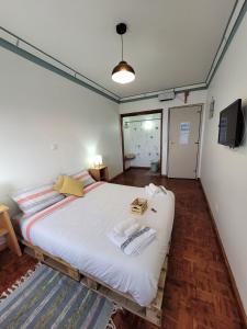 Кровать или кровати в номере The Handmade House Azores