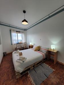 Кровать или кровати в номере The Handmade House Azores