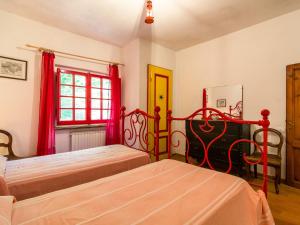Posteľ alebo postele v izbe v ubytovaní Holiday Home near Abetone Ski Lift