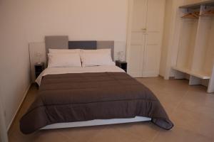 Postel nebo postele na pokoji v ubytování CasaPaola b&b Rooms