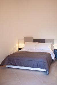 Postel nebo postele na pokoji v ubytování CasaPaola b&b Rooms