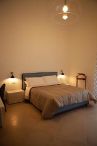 Postel nebo postele na pokoji v ubytování CasaPaola b&b Rooms