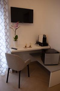 TV a/nebo společenská místnost v ubytování CasaPaola b&b Rooms