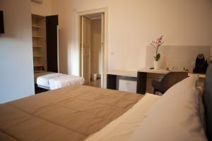 Postel nebo postele na pokoji v ubytování CasaPaola b&b Rooms