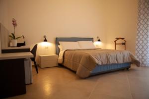 Postel nebo postele na pokoji v ubytování CasaPaola b&b Rooms