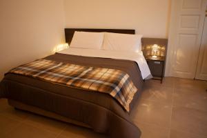 Postel nebo postele na pokoji v ubytování CasaPaola b&b Rooms