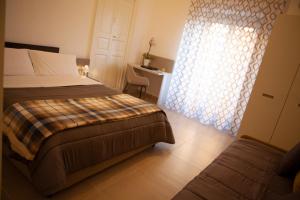 Postel nebo postele na pokoji v ubytování CasaPaola b&b Rooms