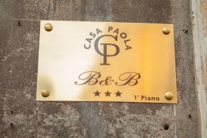 Certifikát, hodnocení, plakát nebo jiný dokument vystavený v ubytování CasaPaola b&b Rooms
