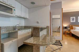 A cozinha ou cozinha compacta de Mercure Belo Horizonte Savassi