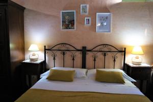 Postel nebo postele na pokoji v ubytování B&B Villa Giusy