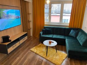 TV a/nebo společenská místnost v ubytování D&T by Tomazzo