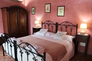 Postel nebo postele na pokoji v ubytování B&B Villa Giusy