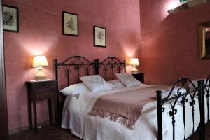Postel nebo postele na pokoji v ubytování B&B Villa Giusy