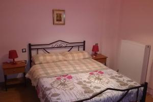 Postel nebo postele na pokoji v ubytování VILLA RIA