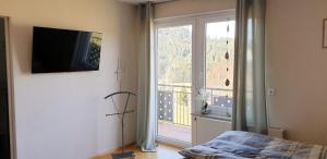 Ein Bett oder Betten in einem Zimmer der Unterkunft Ferienhaus Seefried