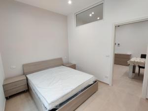 Ένα ή περισσότερα κρεβάτια σε δωμάτιο στο Bilocale incantevole a Barletta - Puglia