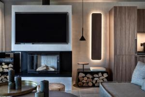 A television and/or entertainment centre at Ardor Exclusive Villas