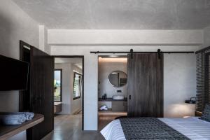 A bed or beds in a room at Ardor Exclusive Villas
