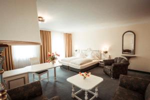 Postel nebo postele na pokoji v ubytování Hotel Limmerhof