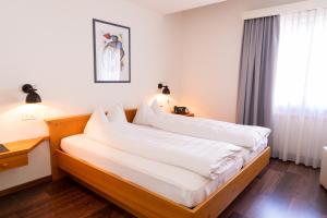 Krevet ili kreveti u jedinici u okviru objekta Hotel Schatzmann