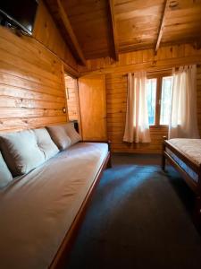 Ένα ή περισσότερα κρεβάτια σε δωμάτιο στο CABAÑAS MANOLO