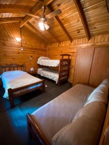 Ένα ή περισσότερα κρεβάτια σε δωμάτιο στο CABAÑAS MANOLO