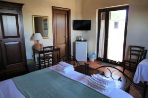 Postel nebo postele na pokoji v ubytování B&B Villa Giusy