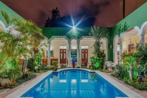 Bazén v ubytování Hotel Santa María Mérida nebo v jeho okolí