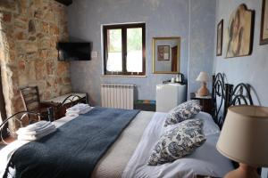 A bed or beds in a room at B&B Villa Giusy