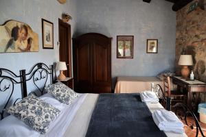 Postel nebo postele na pokoji v ubytování B&B Villa Giusy