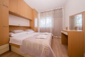 Кровать или кровати в номере Apartment Marisol Barbat
