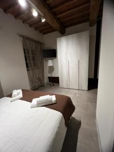Postel nebo postele na pokoji v ubytování Casa Carducci 33