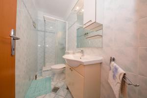 Kúpeľňa v ubytovaní Apartment Marisol Barbat + 37 fotografií