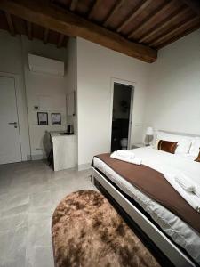 Postel nebo postele na pokoji v ubytování Casa Carducci 33