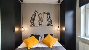Łóżko lub łóżka w pokoju w obiekcie GRYF Apartamenty Holiday Family