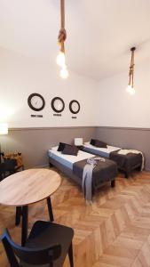 Łóżko lub łóżka w pokoju w obiekcie GRYF Apartamenty Holiday Family