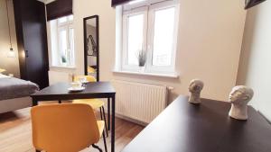 Łóżko lub łóżka w pokoju w obiekcie GRYF Apartamenty Holiday Family
