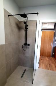 Łazienka w obiekcie GRYF Apartamenty Holiday Family