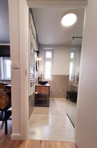 Kuchnia lub aneks kuchenny w obiekcie GRYF Apartamenty Holiday Family