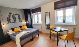 Łóżko lub łóżka w pokoju w obiekcie GRYF Apartamenty Holiday Family